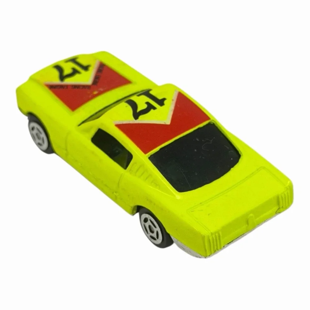 Vintage Yellow Diecast Toy Car with Racing Decals‎